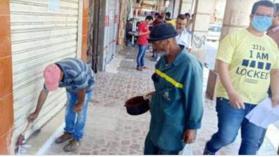 بعد مخالفة مواعيد الغلق.. غلق وتشميع 38 محلا بالجيزة