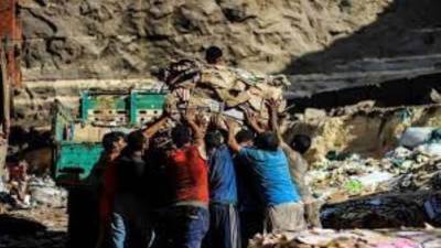 وزيرة البيئة تكشف عدد جامعي القمامة الجاري تقنين أوضاعهم 