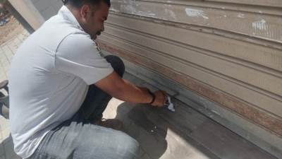 تنفيذ ٩٨ قرار غلق وتشميع وحدات ومحال مخالفة بالعاشر من رمضان وبدر