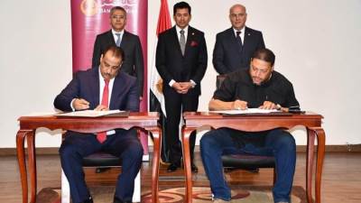 أشرف صبحي يشهد توقيع عقود ٧ فروع لبنك مصر بمراكز الشباب