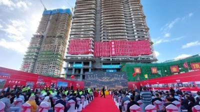 تنظيم احتفالية للانتهاء من الهيكل الخرسانى لأول برج بـ«داون تاون» بالعلمين 