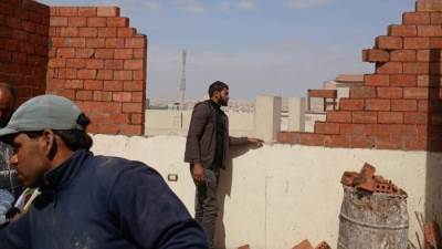 جهاز مدينة الشيخ زايد يواصل حملاته لرصد مخالفات البناء وإزالتها فورًا