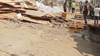 جهاز 6 أكتوبر يزيل بؤر الفرز والغرف العشوائية بالفاصل السكني الصناعي 