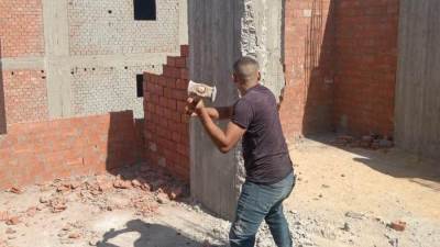 وزيرة التنمية المحلية: إزالة أدوار مخالفة لعقار مرصود بحي الوراق