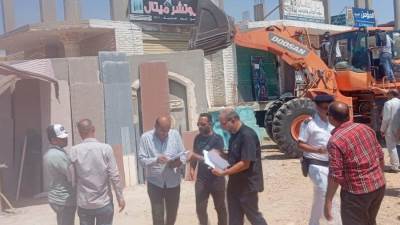 جهاز العاشر من رمضان ينفذ ٢٩ قرار غلق وتشميع ويزيل ١١٢ مخالفة بناء بالردود