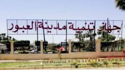 جهاز مدينة العبور ينتهي من أعمال ضبط منسوب غرفة التليفونات بخط (10)