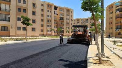 رئيس جهاز 15 مايو يتابع أعمال تنفيذ الطبقة الأسفلتية السطحية بمنطقة الـ120 فدان