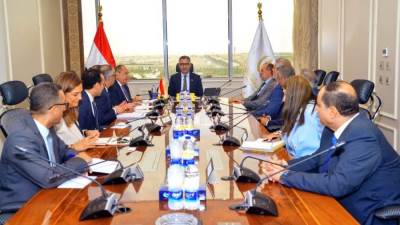 شراكة استراتيجية بين "التموين" و"إي أند مصر" لرقمنة وتطوير منافذ "كاري أون"