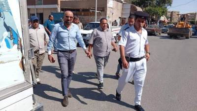 جهاز 15 مايو يواصل حملاته الميدانية لرفع الإشغالات بسوق مجاورة 6