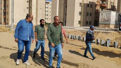 جهاز مدينة بدر يواصل تطوير الطريق الشمالي وطريق الحي الثاني 