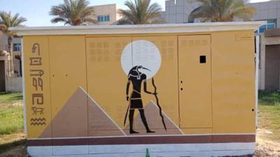 جهاز مدينة 6 أكتوبر ينفذ أعمال تجميل الأكشاك الكهربائية برسومات فرعونية