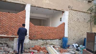 جهاز مدينة 6 أكتوبر يسحب وحدات مخالفة بالحي الثاني عشر