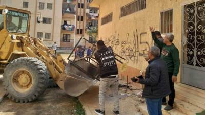 حملة لرفع الإشغالات للحفاظ على النظام العام بمدينة حدائق العاشر